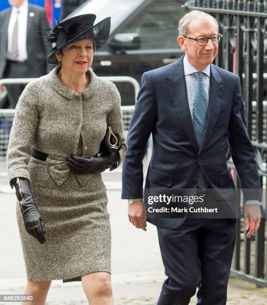 British Prime Minister Theresa May and Phillip May attend a Service to mark the 77th anniversary of The Battle Of Britain at Westminster Abbey on...