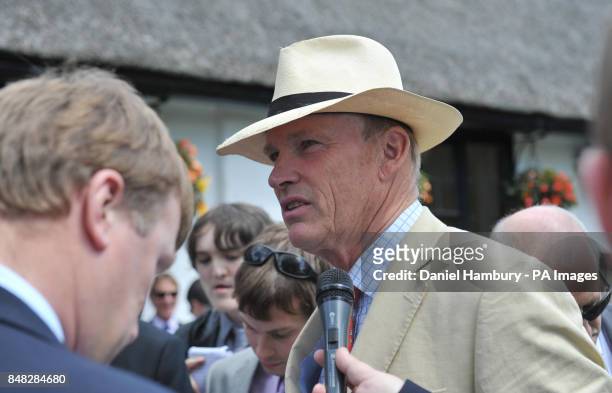 John Gosden trainer of Shantaram who won The Bahrain Trophy during Goldsmiths Ladies day of The Piper Heidsieck July Festival at Newmarket...