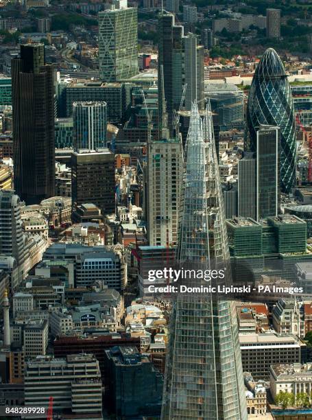 Aerial view of central London, showing the Shard , and the City financial district, including the Swiss Re Tower, also known as the Gherkin. PRESS...