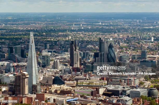 Aerial view of central London, showing the Shard , and the City financial district, including the Swiss Re Tower, also known as the Gherkin. PRESS...