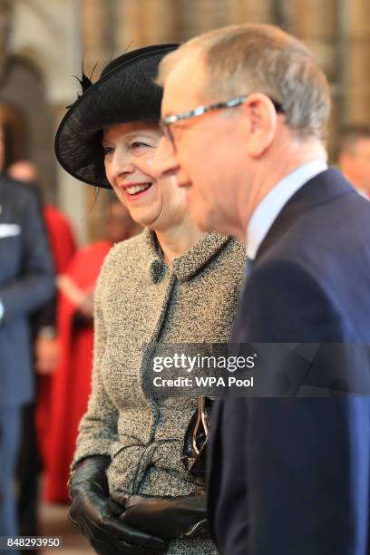 Prime Minister Theresa May and her husband Philip attend a service to mark the 77th anniversary of the Battle of Britain at Westminster Abbey on...