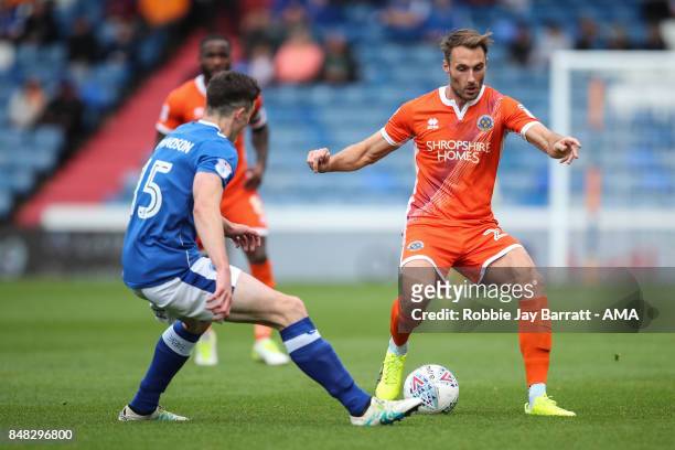 George Edmundson of Oldham Athletic and Alex Rodman of Shrewsbury Town during the Sky Bet League One match between Oldham Athletic and Shrewsbury...
