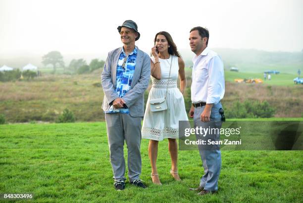 Bob Rubin, Shamin Abas and Guest attend The Bridge 2017 at the Former Bridgehampton Race Circuiton on September 16, 2017 in Bridgehampton, New York.