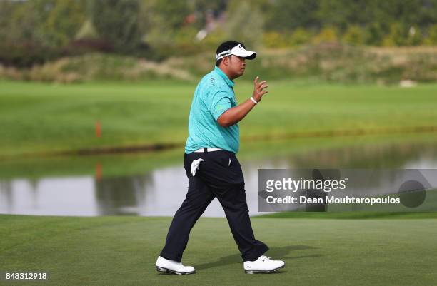 Kiradech Aphibarnrat of Thailand acknowledges the crowd after a birdie on the 3rd green during Day Four of the KLM Open at The Dutch on September 17,...