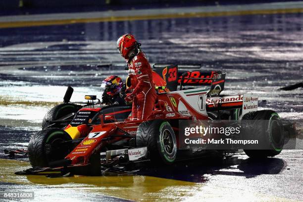 Kimi Raikkonen of Finland driving the Scuderia Ferrari SF70H and Max Verstappen of the Netherlands driving the Red Bull Racing Red Bull-TAG Heuer...