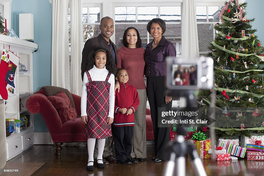 Family taking Holiday portrait with digital camera