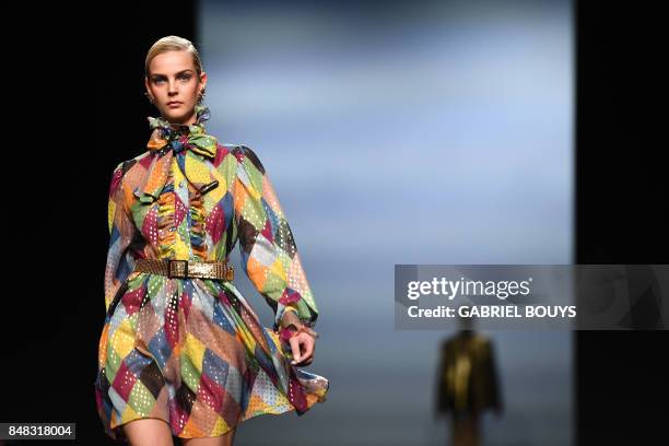 Model presents a creation of Maria Escote's Spring/Summer 2018 collection during the Madrid Fashion Week in Madrid on September 17, 2017.