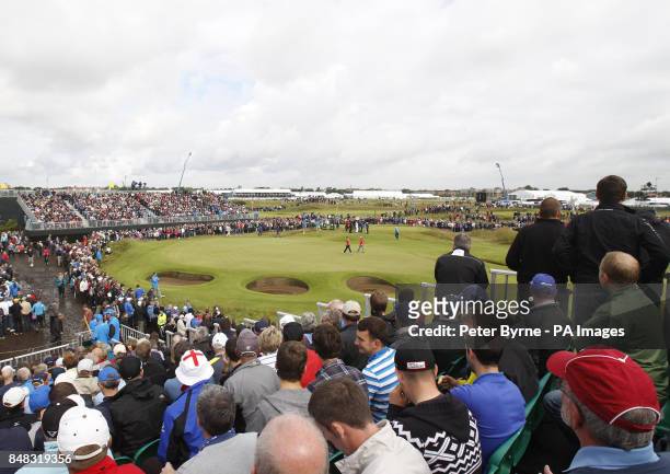 S Keegan Bradley and walk to the Northern Ireland's Rory McIlroy during day two of the 2012 Open Championship at Royal Lytham & St. Annes Golf Club,...