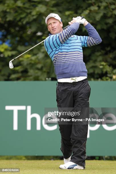 England's Steven Tiley tees off