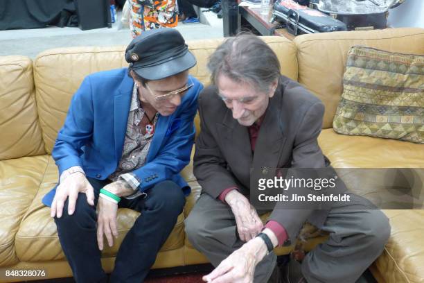 Harry Dean Stanton and Slim Jim Phantom backstage before his concert and the Repo Man screening at the Regent Theater in Los Angeles, California on...