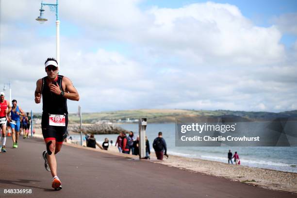 Participants compete in the run leg of the race during IRONMAN 70.3 Weymouth on September 17, 2017 in Weymouth, England.