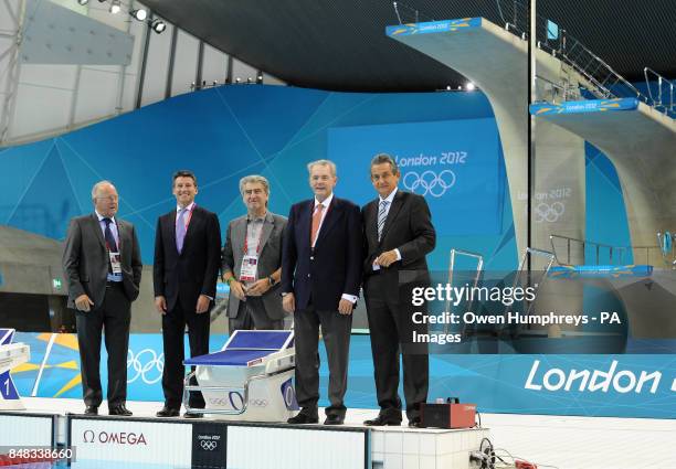 Omega timing board member Peter Hurzeler, Lord Sebastian Coe, Swatch Group CEO Nick Hayek , President of the International Olympic Committee Jacques...