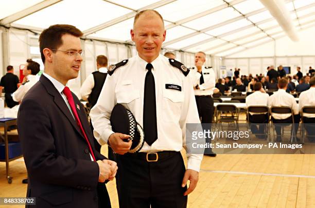 Commander Bob Broadhurst with Security Minister Police James Brokenshire at the Battersea Muster Briefing and Deployment Centre at Battersea Power...