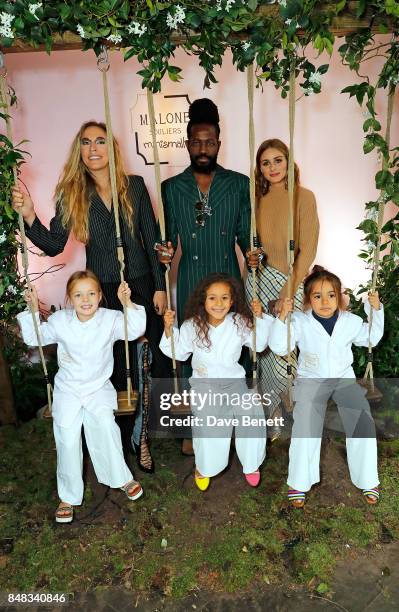 Mary Alice Malone, Roy Luwolt and Olivia Palermo attend the Malone Souliers London Fashion Week SS18 Presentation on September 17, 2017 in London,...