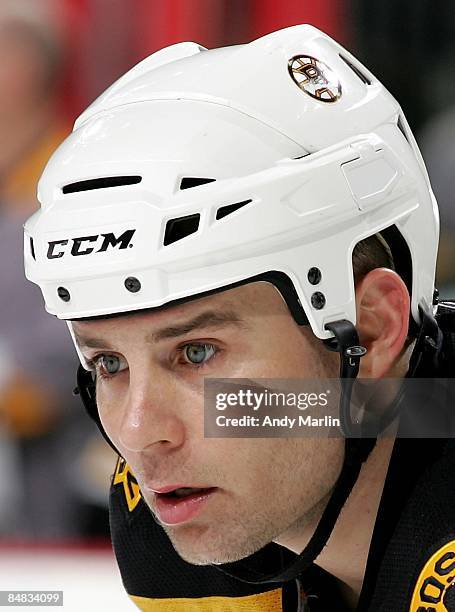 Marc Savard of the Boston Bruins looks on against the New Jersey Devils at the Prudential Center on February 13, 2009 in Newark, New Jersey. The...