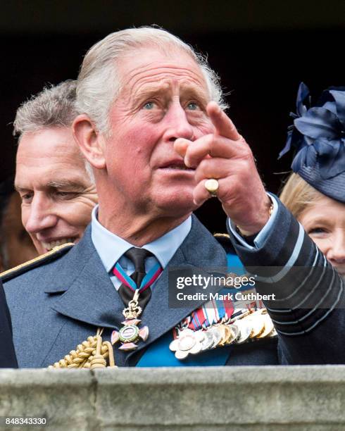 Prince Charles, Prince of Wales watches a flypast after a Service to mark the 77th anniversary of The Battle Of Britain at Westminster Abbey on...