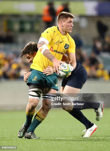 Sean McMahon of the Wallabies is tackled during The Rugby Championship match between the Australian Wallabies and the Argentina Pumas at Canberra...