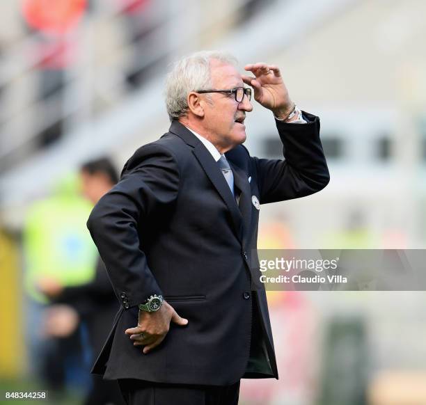Head coach Udinese Calcio Luigi Del Neri reacts during the Serie A match between AC Milan and Udinese Calcio at Stadio Giuseppe Meazza on September...