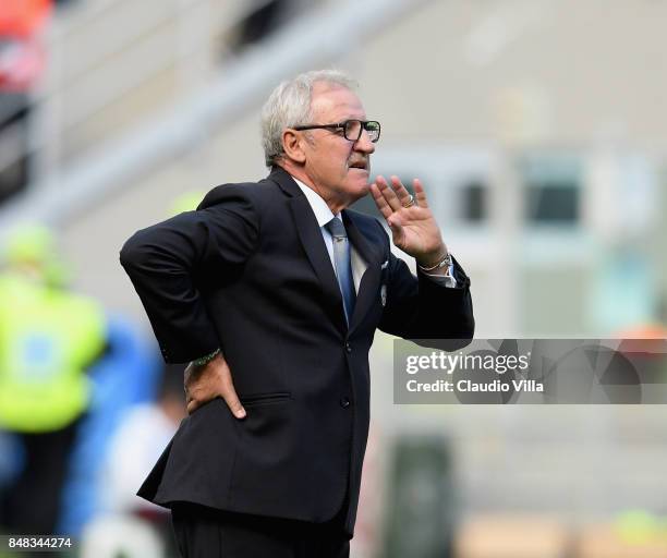 Head coach Udinese Calcio Luigi Del Neri reacts during the Serie A match between AC Milan and Udinese Calcio at Stadio Giuseppe Meazza on September...