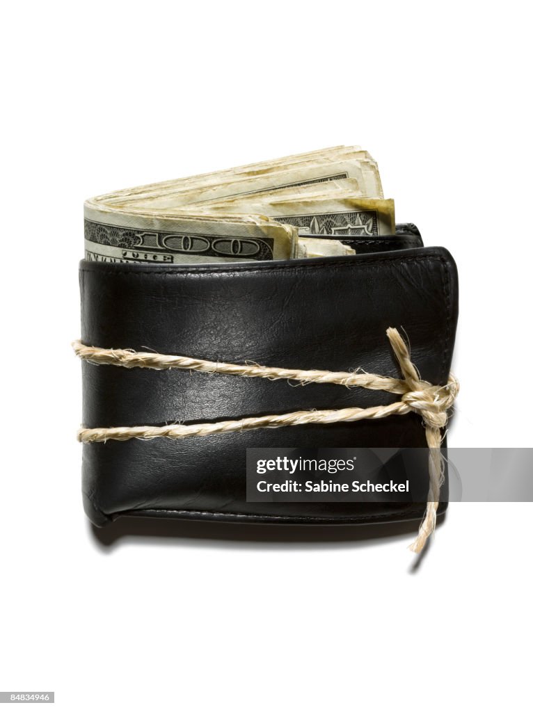 Twine wrapped around full wallet