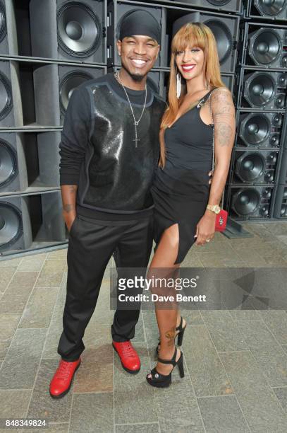 Ne-Yo and Crystal Renay attend the Versus SS18 catwalk show during London Fashion Week September 2017 at Central St Martins on September 17, 2017 in...