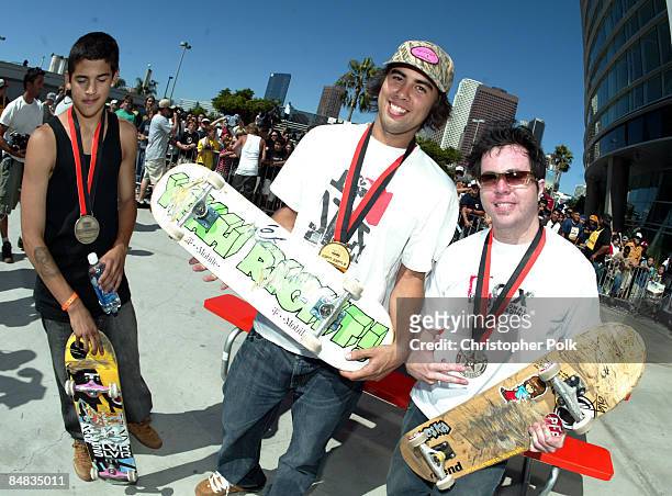 Paul Rodriguez, Eric Koston and Rodil de Araujo, Jr. Pose for photographers during the awards ceremony at the X-Games IX - Skateboard Street contest...