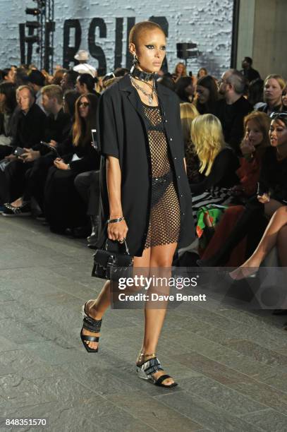 Adwoa Aboah attends the Versus SS18 catwalk show during London Fashion Week September 2017 at Central St Martins on September 17, 2017 in London,...