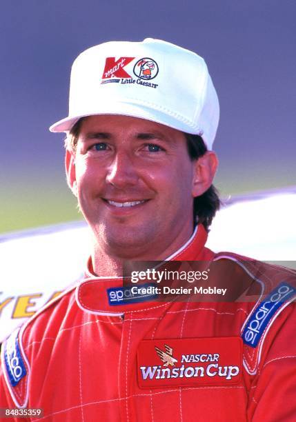 Driver John Andretti smiles before the Daytona 500 race on February 18, 1996 at the Daytona International Speedway in Daytona Beach, Florida.