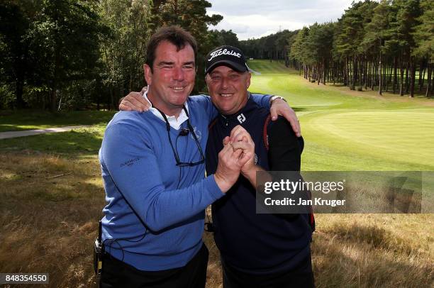 Albert MacKenzie, Captain of the Great Britain and Ireland PGA Cup team celebrate the win with Jon Bevan during the singles matches on the final day...