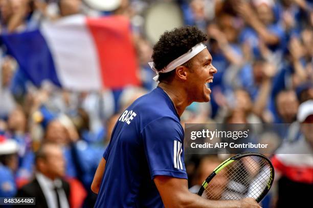 France's player Jo-Wilfried Tsonga reacts after winning the Davis Cup World Group semi-final tennis match against Serbia at The Pierre Mauroy Stadium...