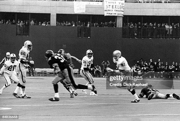 Playoffs: Pittsburgh Steelers Franco Harris in action, making catch vs Oakland Raiders Phil Villapiano . Ball was deflected as a result of Raiders...