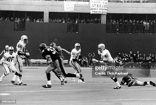 Playoffs: Pittsburgh Steelers Franco Harris in action, making catch vs Oakland Raiders Phil Villapiano . Ball was deflected as a result of Raiders...
