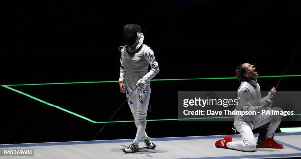 Italy's Valentina Vezzali celebrates beating Hyun Hee Nam in the women's foil bronze medal match at the ExCel arena in London.
