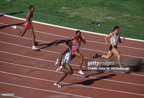 Summer Olympics: Aerial view of Australia Darren Clark in action, leading race vs Ivory Coast Gabriel Tiacoh and USA Alonzo Babers during Men's 400M...