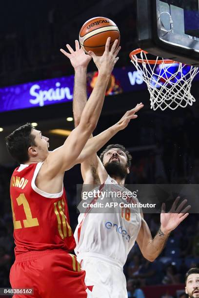 Russia's Semen Antonov vies with Spain's Pierre Oriola during the FIBA Euro basket 2017 men's 3rd game match between Spain and Russia at Fenerbahce...