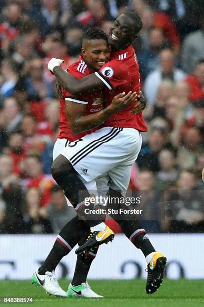 Antonio Valencia of Manchester United celebrates scoring his sides first goal with Eric Bailly of Manchester United during the Premier League match...
