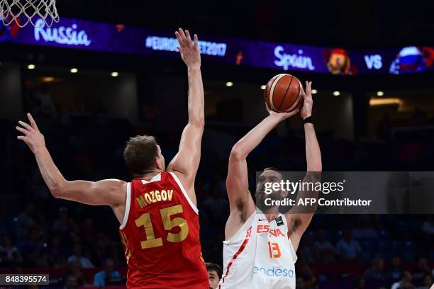 Spain's center Marc Gasol tries to score next to Russia's center Timofey Mozgov during the FIBA Euro basket 2017 men's 3rd game match between Spain...