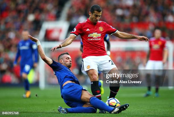 Morgan Schneiderlin of Everton tackles Henrikh Mkhitaryan of Manchester United during the Premier League match between Manchester United and Everton...