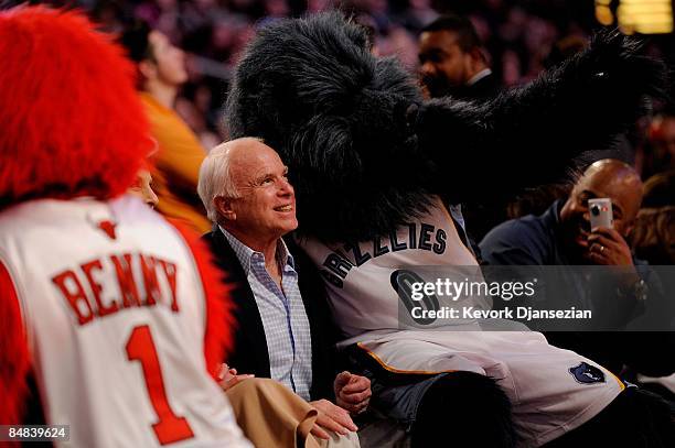 Senator John McCain greets mascot Grizz of the Memphis Grizzlies during the 58th NBA All-Star Game, part of 2009 NBA All-Star Weekend at US Airways...