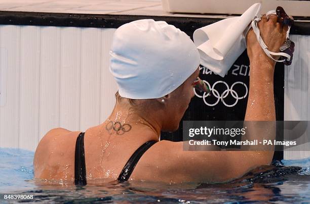 Republic of Ireland's Melanie Nocher with an Olympic Rings tattoo on her neck after finishing seventh in the Women's 200m Backstroke Heat 2 at the...