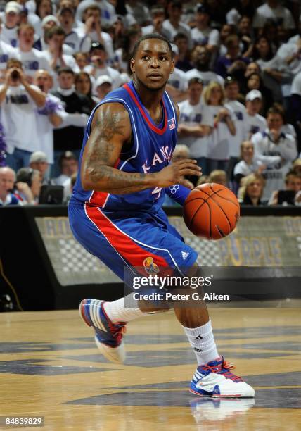 Sherron Collins of the Kansas Jayhawks brings the ball up court against the Kansas State Wildcats on February 14, 2009 at Bramlage Coliseum in...