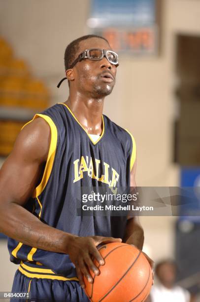 Vernon Goodridge of the La Salle Explores takes a foul shot during a college basketball game against the George Washington Colonials on February 11,...