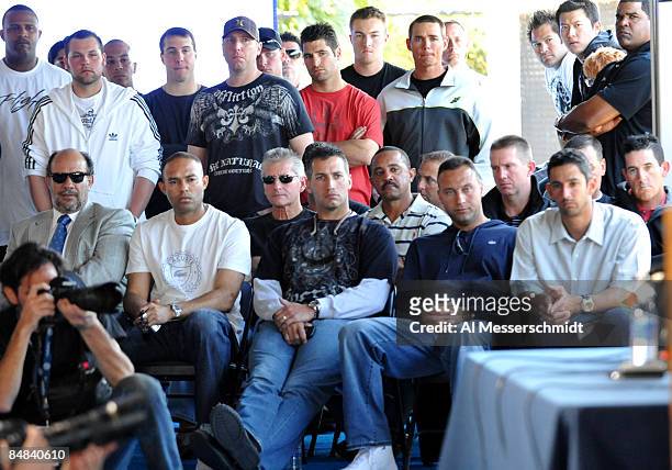 Teammates of infielder Alex Rodriguez of the New York Yankees, including Jorge Posada, Derek Jeter, Andy Pettitte and Mariano Rivera, listen during a...