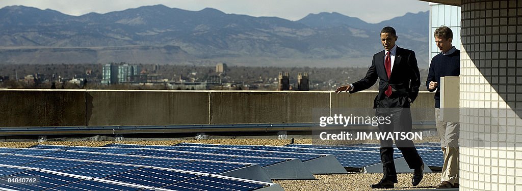 US President Barack Obama (L) walks with