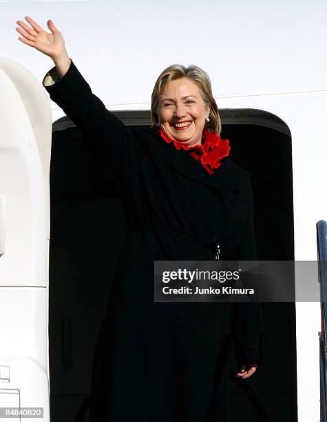 Secretary of State Hillary Clinton waves upon her departure at Tokyo International Airport on February 18, 2009 in Tokyo, Japan. Clinton is on her...