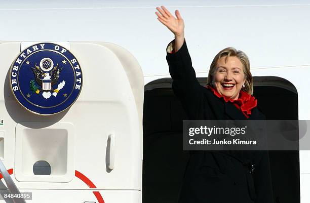 Secretary of State Hillary Clinton waves upon her departure at Tokyo International Airport on February 18, 2009 in Tokyo, Japan. Clinton is on her...