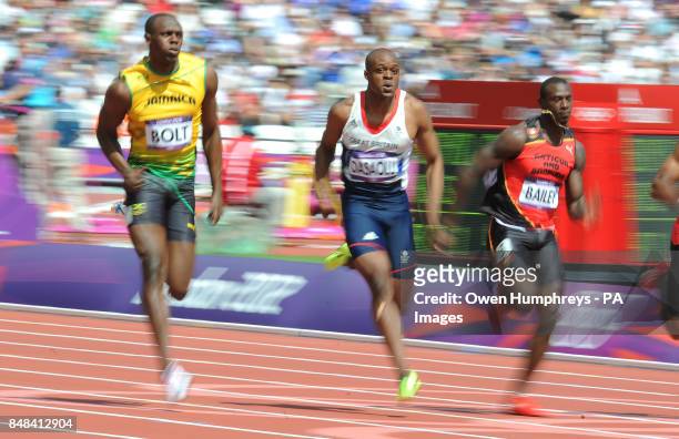 Jamaica's Usian Bolt and Great Britain's James Dasaolu and Antigas Daniel Bailey in the 100m preliminary round at The Olympic Stadium, London.