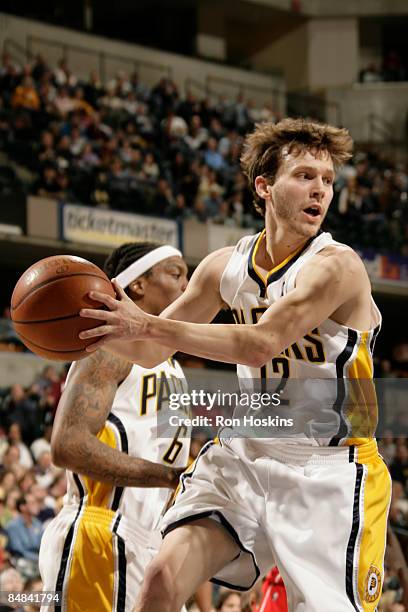 Travis Diener of the Indiana Pacers rebounds on the the Philadelphia 76ers at Conseco Fieldhouse on February 17, 2009 in Indianapolis, Indiana. NOTE...