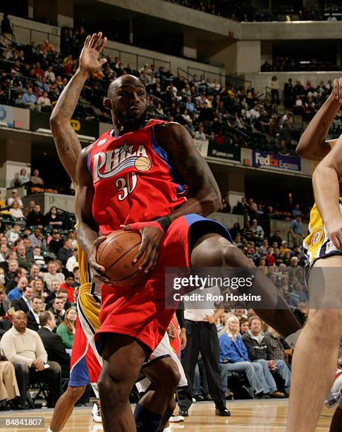 Reggie Evans of the Philadelphia 76ers rebounds on the Indiana Pacers at Conseco Fieldhouse on February 17, 2009 in Indianapolis, Indiana. NOTE TO...