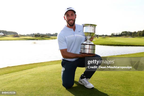 Romain Wattel of France poses with the trophy after winning on Day Four of the KLM Open at The Dutch on September 17, 2017 in Spijk, Netherlands.